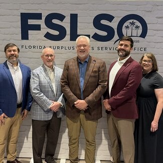 Mark Shealy, center, with FSLSO Board Chair Conor O'Leary, Wertheim College Dean Michael Hartline, department chair Brad Karl and senior associate dean Kathleen McCullough